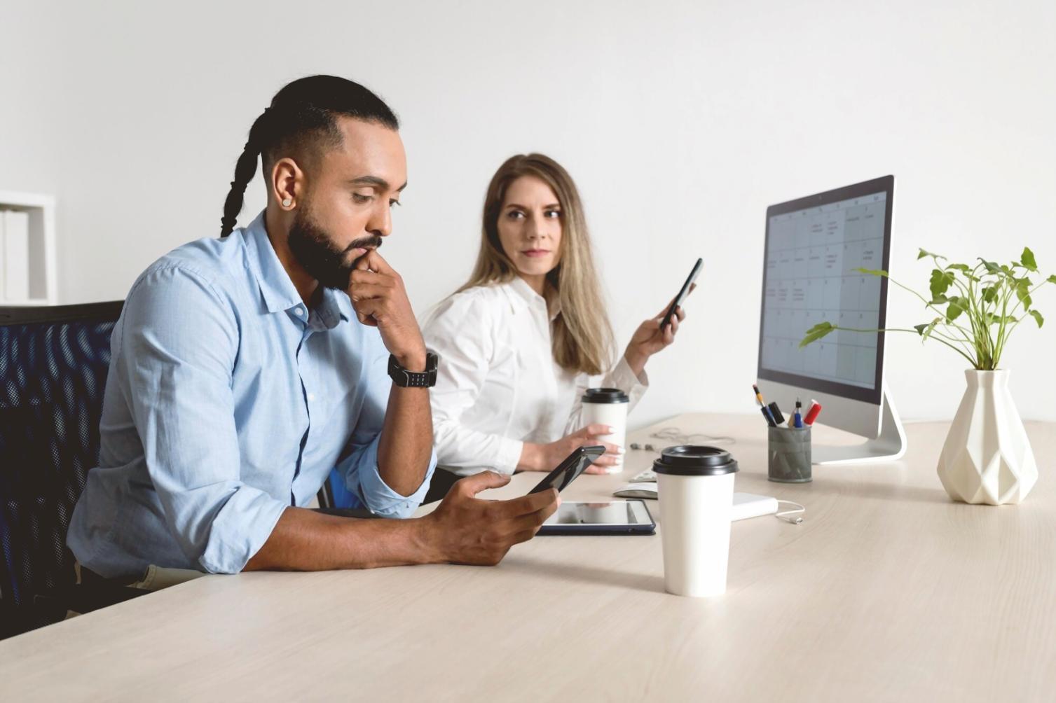 Students reviewing financial charts and inflation data during workshop session